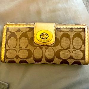 Tan/gold coach wallet